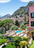Villa with pool and garden overlooking a mountainous town