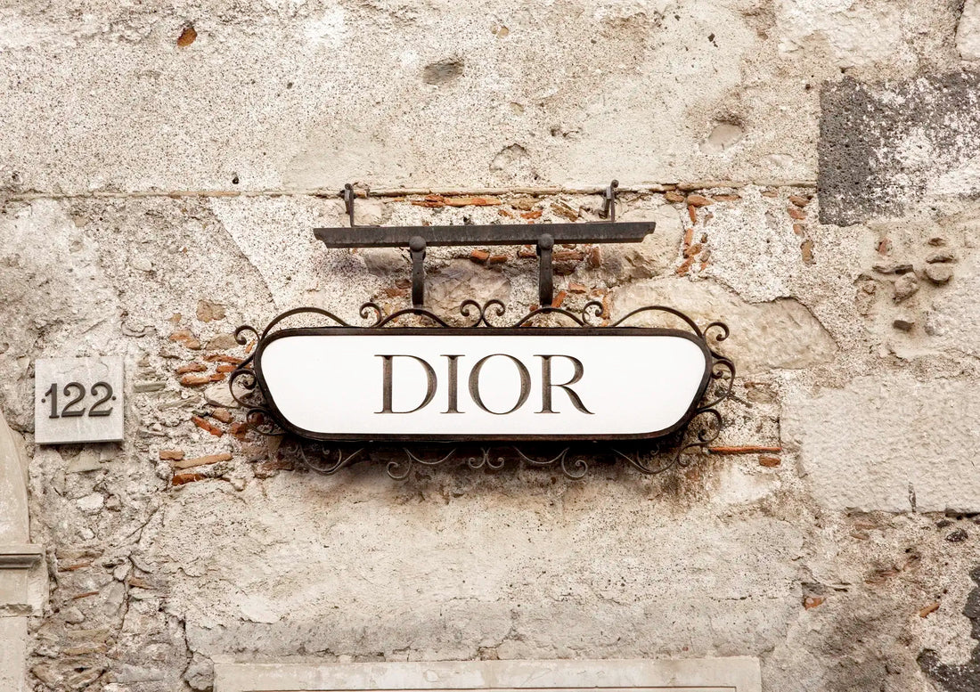 Dior sign on a textured wall