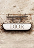 Dior sign on a textured wall