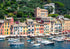 Harbour scene with boats and colorful buildings in Portofino, Italy